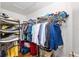Spacious walk-in closet with ample storage and shelving for organization at 7242 Sw 115Th Pl, Ocala, FL 34476