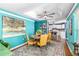 Dining room with hardwood floors and close proximity to the kitchen and bar at 7242 Sw 115Th Pl, Ocala, FL 34476