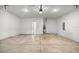 Large, unfinished basement space with concrete flooring and a utility hookup at 7695 Sw 64Th Street Rd, Ocala, FL 34474