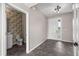 Tile floor entry featuring a half bath and front door at 7695 Sw 64Th Street Rd, Ocala, FL 34474