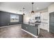 Spacious kitchen with granite countertops, stainless steel appliances, and ample storage at 7695 Sw 64Th Street Rd, Ocala, FL 34474