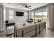 Bright living room with neutral colors, modern furnishings, and sliding glass doors for natural light at 7695 Sw 64Th Street Rd, Ocala, FL 34474