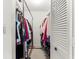 Walk-in closet with rod and shelves providing an abundance of storage at 8850 Sw 97Th St # C, Ocala, FL 34481