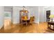 Dining area featuring hardwood floors, a wooden table and a china cabinet at 8850 Sw 97Th St # C, Ocala, FL 34481