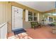 Inviting covered front porch with a bench, perfect for relaxing outdoors at 8850 Sw 97Th St # C, Ocala, FL 34481