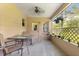 Covered patio with outdoor seating, perfect for relaxing and enjoying the weather at 8850 Sw 97Th St # C, Ocala, FL 34481