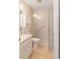 Bathroom with a glass shower, tile flooring, and a modern vanity at 8881 Sw 94Th St # E, Ocala, FL 34481
