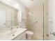 Bathroom featuring glass shower doors, tile flooring, and a modern vanity at 8881 Sw 94Th St # E, Ocala, FL 34481