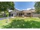 Charming single-story home with a cozy front porch and well-manicured landscaping at 8881 Sw 94Th St # E, Ocala, FL 34481