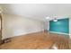 Inviting living room with wood floors, recessed lighting, and bright, neutral walls at 8881 Sw 94Th St # E, Ocala, FL 34481