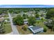 Scenic aerial shot showcases a quiet residential area with tree-lined streets and various homes at 8973 Sw 104Th Pl, Ocala, FL 34481