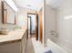 Bathroom with wood vanity and bathtub at 8973 Sw 104Th Pl, Ocala, FL 34481