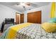 Bedroom featuring a queen-sized bed and closet at 8973 Sw 104Th Pl, Ocala, FL 34481
