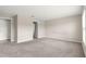 A spacious bedroom features neutral walls, plush carpeting, and access to an en-suite bathroom at 9209 Sw 58Th Cir, Ocala, FL 34476