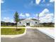 Community clubhouse with well-maintained landscaping, visible parking and handicap access at 9209 Sw 58Th Cir, Ocala, FL 34476