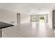 Bright and open living room with tile floors and backyard view at 9209 Sw 58Th Cir, Ocala, FL 34476