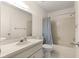 Well-lit bathroom with tub-shower, vanity, and mirror at 9367 Sw 83Rd Ave # C, Ocala, FL 34481