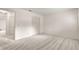 This bedroom has neutral carpet and a closet with louvered doors at 9367 Sw 83Rd Ave # C, Ocala, FL 34481