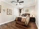 Cozy bedroom with warm wood flooring and neutral color palette at 9634 Sw 67Th St, Ocala, FL 34481