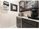 Butler's pantry features a wine cooler, beverage refrigerator, and a coffee station area, perfect for entertaining at 9634 Sw 67Th St, Ocala, FL 34481
