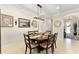 The dining room is spacious with a dining table and neutral paint colors at 9634 Sw 67Th St, Ocala, FL 34481