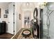 Tastefully decorated foyer with stylish console table, area rug, and views into the home at 9634 Sw 67Th St, Ocala, FL 34481