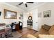 Home office with dark wood flooring and a view into an entry area at 9634 Sw 67Th St, Ocala, FL 34481