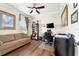 Comfortable home office featuring a couch, desk area, and neutral paint at 9634 Sw 67Th St, Ocala, FL 34481