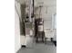 Basement utility room with furnace, hot water tank, and laundry sink at 9711 Sw 97Th Pl, Ocala, FL 34481