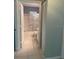 This bathroom features a shower with a grab bar and clear sliding door, offering convenience at 9711 Sw 97Th Pl, Ocala, FL 34481