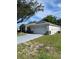 Charming single-story home with a two-car garage and lush lawn at 9711 Sw 97Th Pl, Ocala, FL 34481