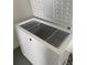 A spacious white freezer with two wire baskets at 9711 Sw 97Th Pl, Ocala, FL 34481