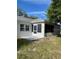 A view of the outdoor space with a covered patio at 9711 Sw 97Th Pl, Ocala, FL 34481