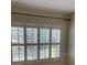 Window with shutters offers plenty of natural light at 9711 Sw 97Th Pl, Ocala, FL 34481