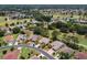 Scenic aerial view of a residential area with neat landscaping, homes and golf course at 15776 Sw 11Th Terrace Rd, Ocala, FL 34473