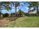 Backyard showcasing a screen-enclosed area at 15776 Sw 11Th Terrace Rd, Ocala, FL 34473