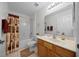 Well lit bathroom showcasing vanity sink, toilet and shower with curtain at 15776 Sw 11Th Terrace Rd, Ocala, FL 34473