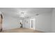 Bedroom with neutral carpet, a ceiling fan, and multiple doorways to other rooms at 15776 Sw 11Th Terrace Rd, Ocala, FL 34473