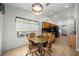 Cozy breakfast nook featuring granite counters with views of the yard at 15776 Sw 11Th Terrace Rd, Ocala, FL 34473