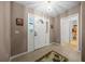 Tiled foyer entrance with decorative front door and sidelight panel at 15776 Sw 11Th Terrace Rd, Ocala, FL 34473