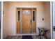 Inviting front door with sidelights and transom window adds elegance and curb appeal at 15776 Sw 11Th Terrace Rd, Ocala, FL 34473