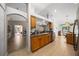 Well-lit kitchen with stainless steel appliances and granite countertops at 15776 Sw 11Th Terrace Rd, Ocala, FL 34473