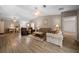 Open concept living space featuring hardwood floors and vaulted ceilings at 15776 Sw 11Th Terrace Rd, Ocala, FL 34473