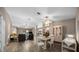 Spacious living room featuring hardwood floors and large windows for natural light at 15776 Sw 11Th Terrace Rd, Ocala, FL 34473