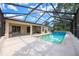 A screened in swimming pool and a paved patio area at 15776 Sw 11Th Terrace Rd, Ocala, FL 34473