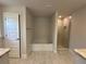 Bathroom features a soaking tub and tiled shower at 180 Willow Rd, Ocala, FL 34472