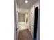 Bright bathroom featuring a soaking tub and a separate glass-enclosed shower at 180 Willow Rd, Ocala, FL 34472