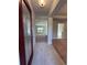 Inviting entryway featuring tile flooring, a decorative front door, and carpeted living spaces at 180 Willow Rd, Ocala, FL 34472