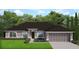 Charming single-story home with a well-manicured lawn and a two-car garage at 180 Willow Rd, Ocala, FL 34472