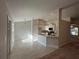 Open-concept kitchen with an island and modern appliances at 180 Willow Rd, Ocala, FL 34472